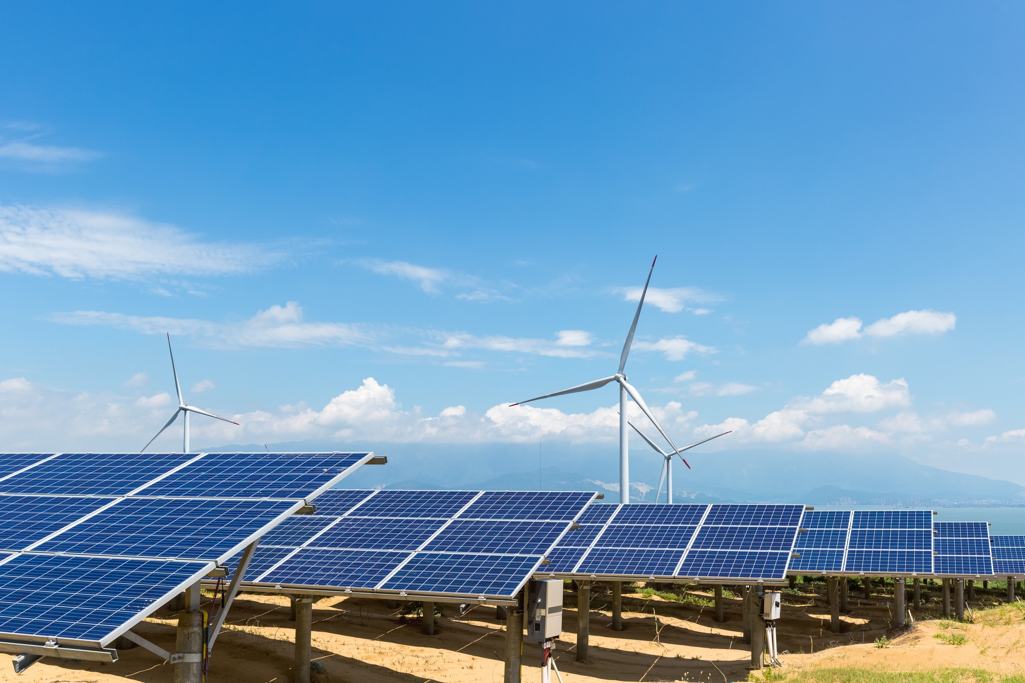 solar power station and wind farm on poyang lakeside, clean energy with clear sky